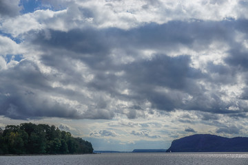 Croton-On-Hudson, New York, USA: View of  the Hudson River under a cloud-filled sky, looking south from Croton Point Park. © Linda Harms