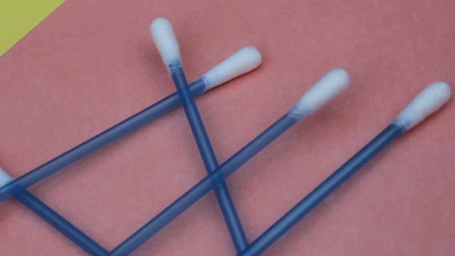 q tip cotton buds turn rotate spin background single use plastic 