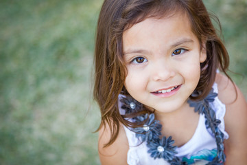 Fototapeta premium Cute Young Mixed Race Baby Girl Portrait Outdoors