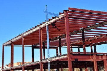 Frame work of new steel  commercial building under construction.