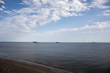 Obraz premium Amazing view of clear sea landscape with cloudy sky as a background Sunset time.