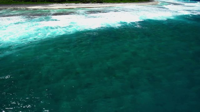 Aerial of Tupai Heart Island coral reef atoll in the South Pacific Ocean
