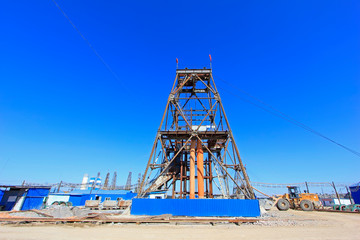 Fototapeta na wymiar Drilling derrick in MaCheng iron mine, China