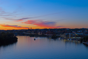 Beautiful sunset over Georgetown waterfront, Washington DC, USA. US capital panorama near Potomac River.