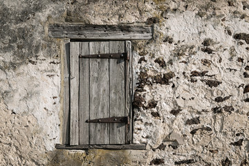 Old stone barn facade.
