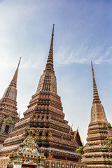 Fototapeta premium Buddhist Stupas in Thailand: Exploring Ancient Temples and Pagodas