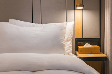 Warm Hotel Bedside and pillows