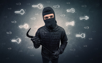 Burglar standing with tools in his hand.