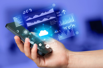 Hand using phone with cloud technology and linked information concept