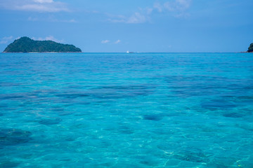 Fototapeta premium Wonderful blue sea at Andaman sea, Beautiful beach at Surin Island, Thailand 