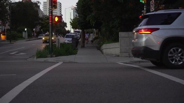 Waiting at the pedestrian light / 	pelican crossing, Vancouver, Canada (slow motion)