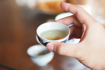 Pick up The Chinese tea cup 