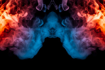 A dynamic explosion of puffs of smoke of light blue pink and red colors on a black background with smooth flames rendering an isolated pattern. Decorative wallpaper with multi-colored swirl  of smoke.