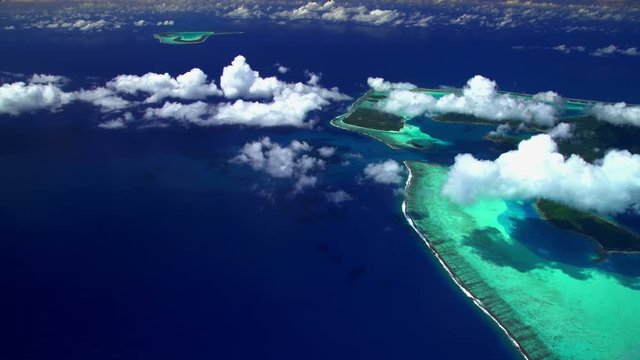 Aerial view of barrier reef on Tupai and Bora Bora Island South Pacific 