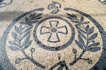 A variety of patterns of paving slabs on the pedestrian zones of Lisbon. Portugal in Autumn