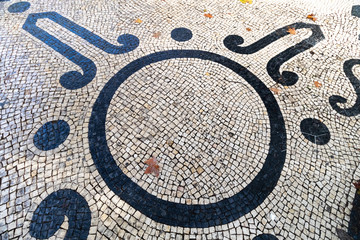 A variety of patterns of paving slabs on the pedestrian zones of Lisbon. Portugal in Autumn
