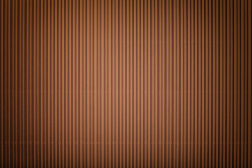 Obraz premium Texture of corrugated bronze paper with vignette, macro.