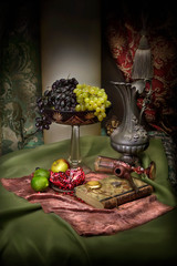 Still life with grapes, wine and fruit