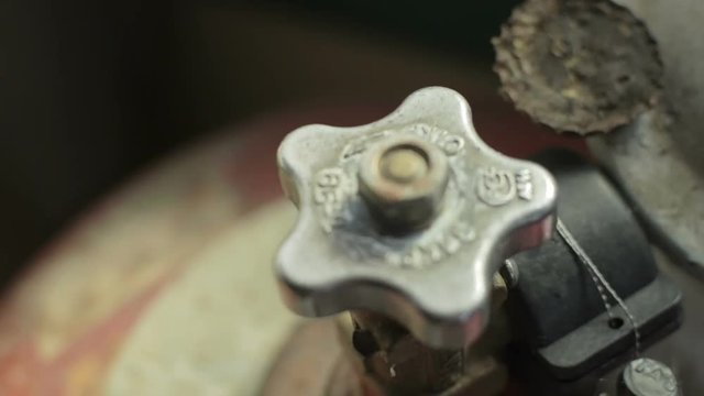 Valve of the gas bottle, countryside in Belarus