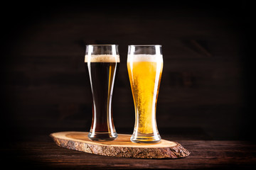 a glass of beer  on wooden background
