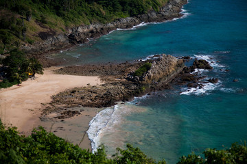 Obraz premium beautiful view of the rocks and the sandy beach from a height. phuket thailand