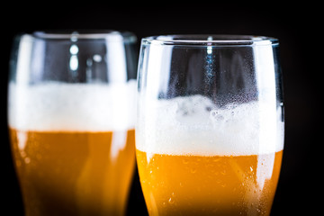 a glass of beer  on wooden background