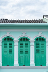Phuket old town : Sino-Portuguese Architecture buildings. This architectural style is European mixed with Chinese modern, Thailand. Ancient window.