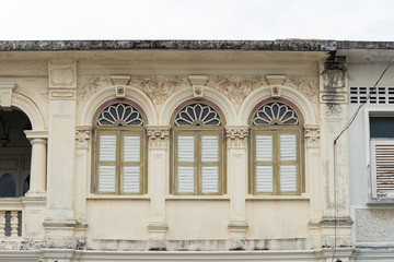 Phuket old town : Sino-Portuguese Architecture buildings. This architectural style is European mixed with Chinese modern, Thailand. Ancient window.
