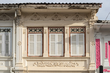 Phuket old town : Sino-Portuguese Architecture buildings. This architectural style is European mixed with Chinese modern, Thailand. Ancient window.