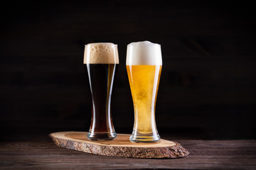 a glass of beer  on wooden background
