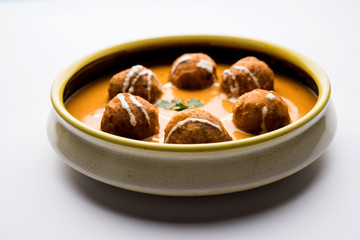 Malai Kofta Curry is a Mughlai special recipe served in a bowl. Selective focus