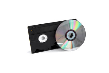 Videocassette and disc isolated on white background.