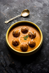 Malai Kofta Curry is a Mughlai special recipe served in a bowl. Selective focus
