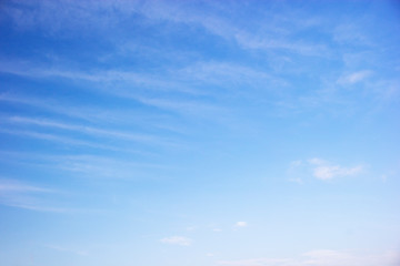 Fantastic soft white clouds against blue sky.