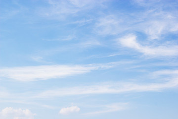 Fantastic soft white clouds against blue sky.