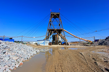 Fototapeta na wymiar Drilling derrick in MaCheng iron mine, China