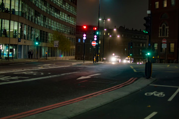 Road and sideways of london at night illuminated