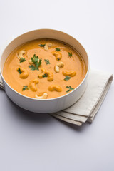 Cashew Curry / Indian kaju masala served in a bowl or pan. selective focus