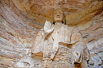 Buddha statues of Yungang Grottoes : The World cultural heritage site, Famous "Buddhist Caves Art Treasure Houses" in Datong, Shanxi Province, China. World heritage site Selective focus. 