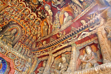 Buddha statues of Yungang Grottoes : The World cultural heritage site, Famous "Buddhist Caves Art Treasure Houses" in Datong, Shanxi Province, China. World heritage site. Selective focus.