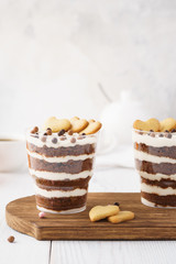 Individual desserts in glasses, chocolate trifle with hearts.