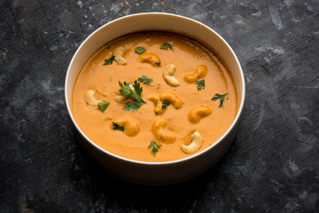 Cashew Curry / Indian kaju masala served in a bowl or pan. selective focus