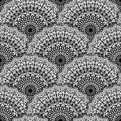 Abstract seamless vector lace pattern. Black and white repeating wallpaper with creative mandalas. Beautiful background with abstract floral scales.