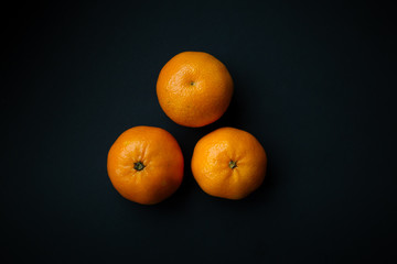  tangerine on a dark background