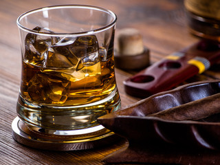 Whisky on the rocks and a cigar