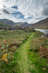 Stunning landscape image of countryside around Llyn Ogwen in Snowdonia during early Autumn