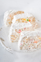 White nougat slices on cutting board