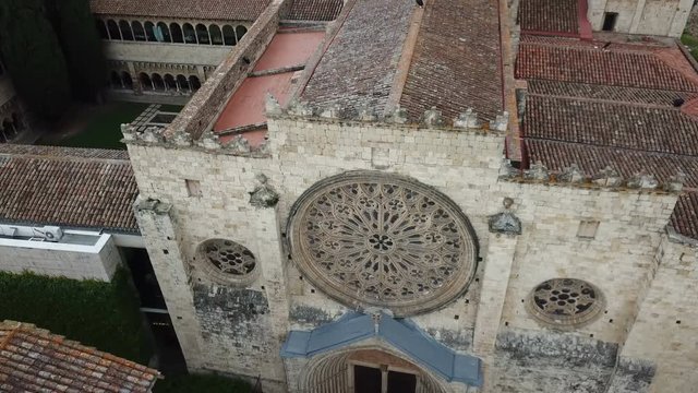 View from drone of ancient Benedictine abbey in Sant Cugat del Valles, Catalonia, Spain