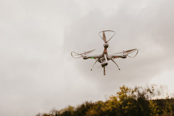 Fototapeta na wymiar Electric drone flies in the sky