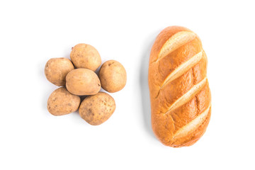 Loaf and potatoes isolated on white background.